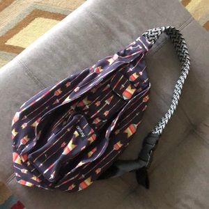 Ambry cross body arrow print sling purse.